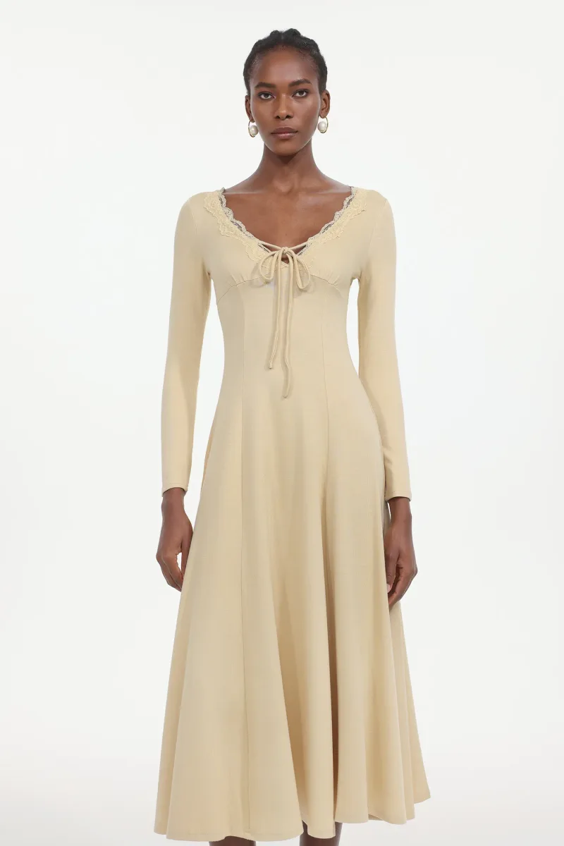 Vestido Maxi Winola em Tricô com Laço de Manga Longa